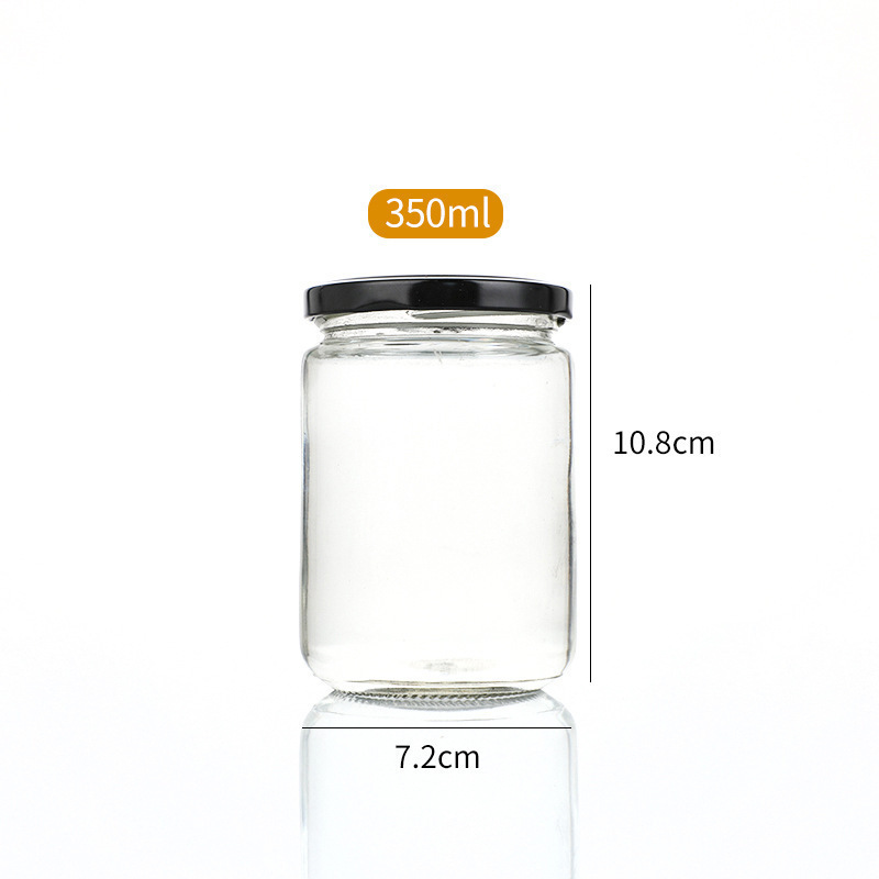 Botella de salsa redonda resistente a altas temperaturas sellada transparente resistente a altas temperaturas botella de melocotón amarillo enlatada botella de miel frutas botella de vidrio spot