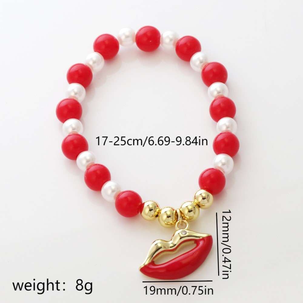 Pulsera con labios, perla y fresa esmaltados