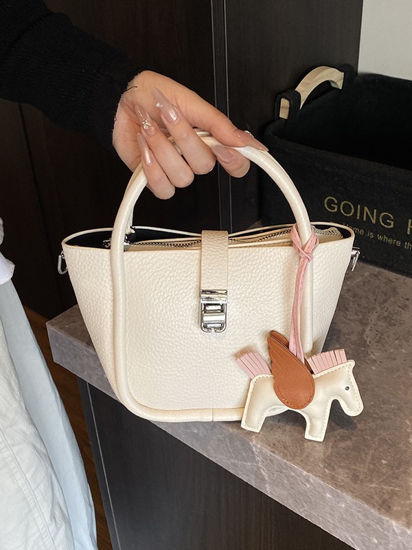 Bolso de cubo para mujer, tendencia transfronteriza de alta gama, bolso de mano con patrón de lichi, viaje diario, bolsa de mensajero de canasta de verduras de estilo occidental