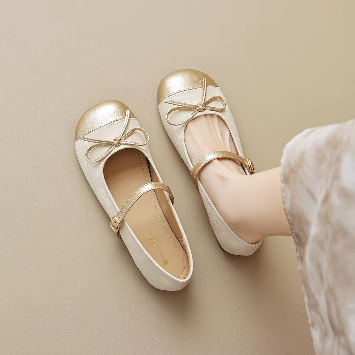 2026 primavera y verano de moda francesa zapatos de una sola mujer plano y poco profundo de verano arco con una correa de zapatos de mujer Mary Jane