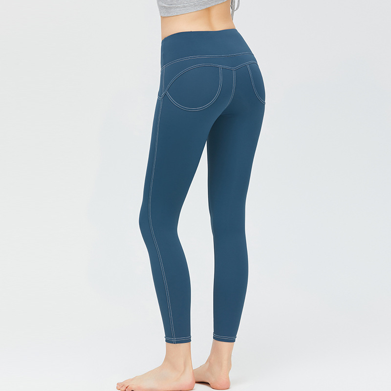 Nueva ropa de Yoga de las mujeres de Bolsillo falso elástico de la cadera melocotón pantalones de alta elástica Pantalones deportivos desnuda sensación sin T-line pantalones de yoga
