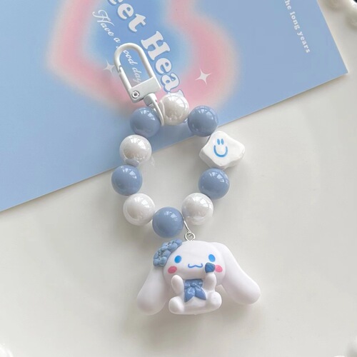 New cream beaded cartoon big-eared dog keychain cute doll short mobile phone chain same mobile phone hanging