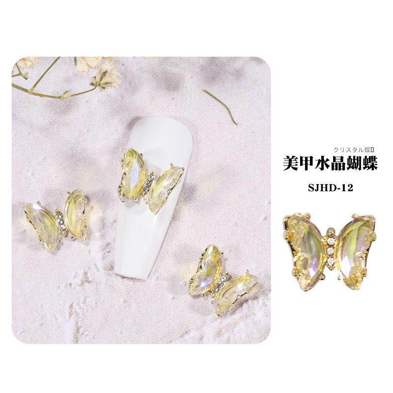 2021 nueva celebridad en línea belleza de uñas mariposa de cristal mágico estilo INS hielo tridimensional transparente Aurora diamante metal decoración de uñas