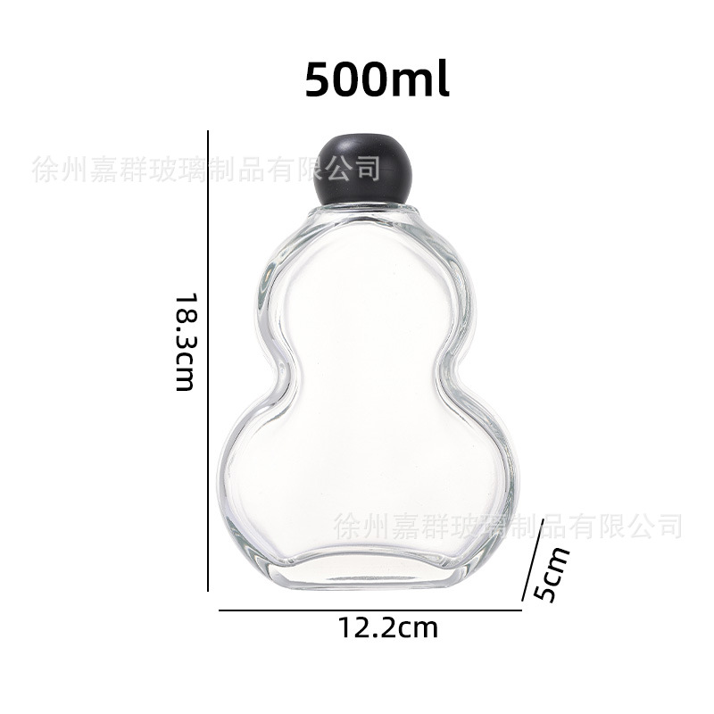 Botellas de vidrio transparentes de vino de fruta, bebida de jugo de fruta, té de leche, vino de fruta auto-elaborado, engrosado envasado, botellas vacías en stock al por mayor