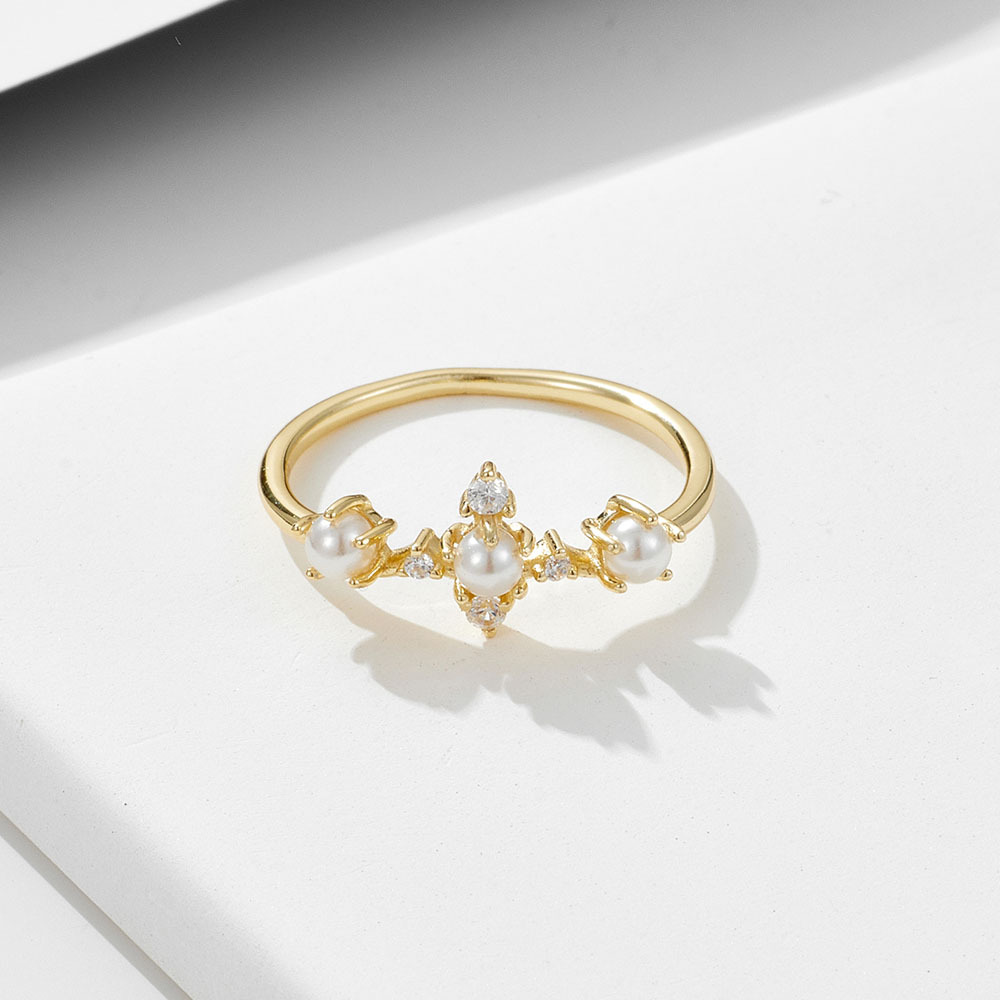 Venta caliente transfronteriza nueva perla corona anillo de plata esterlina hembra europea y americana ins simple luz lujo todo partido anillo joyería