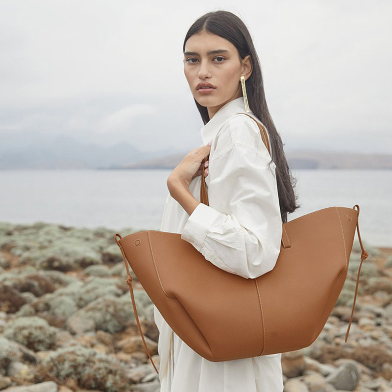 クロスボーダー高バージョン本革POEIVE大容量ショッピングバッグ片肩手提げトート翼女性カバンシワバッグ