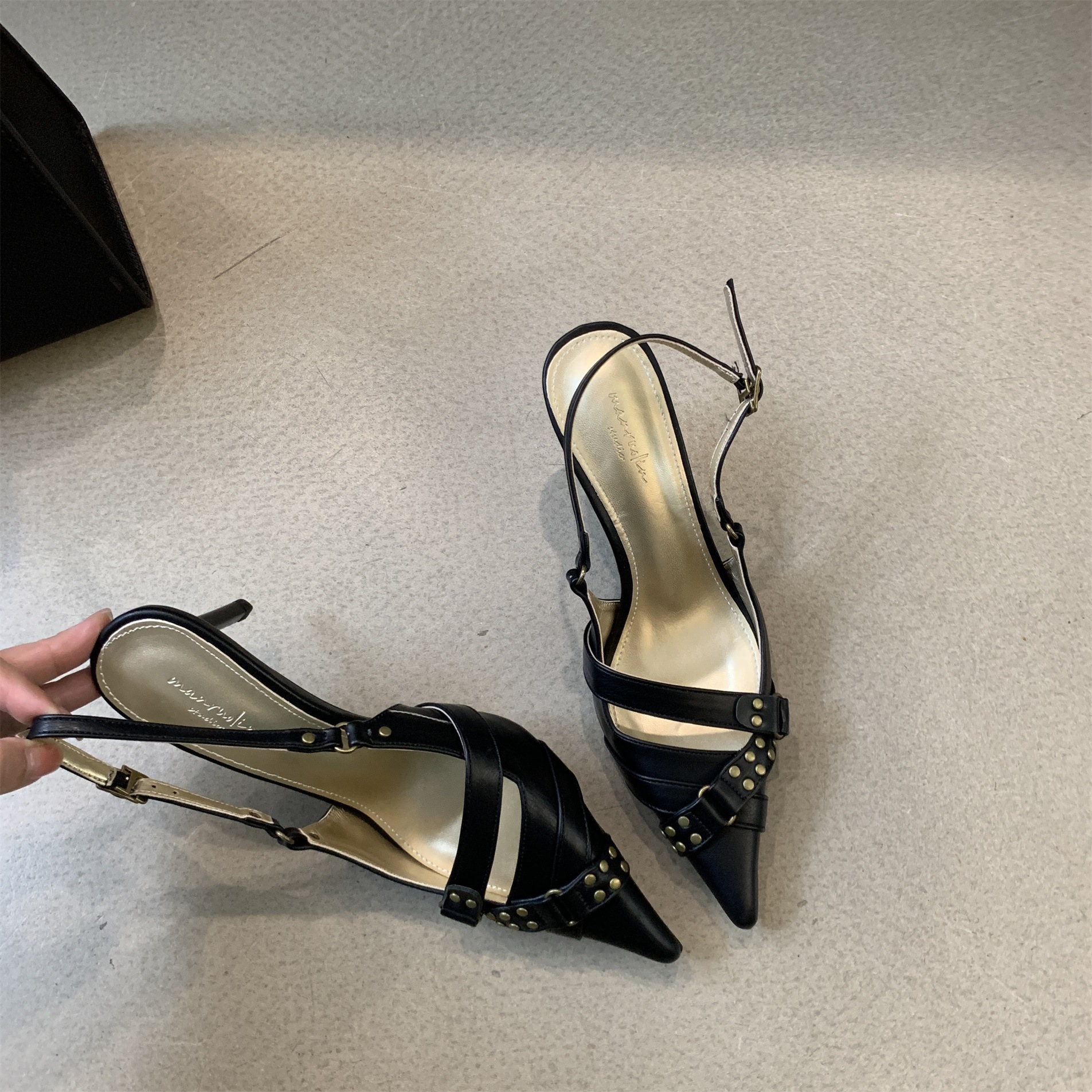 French black high heels, temperament women's shoes, niche shallow mouth pointed toe shoes 2024 summer rivet buckle sandals_voghion.com