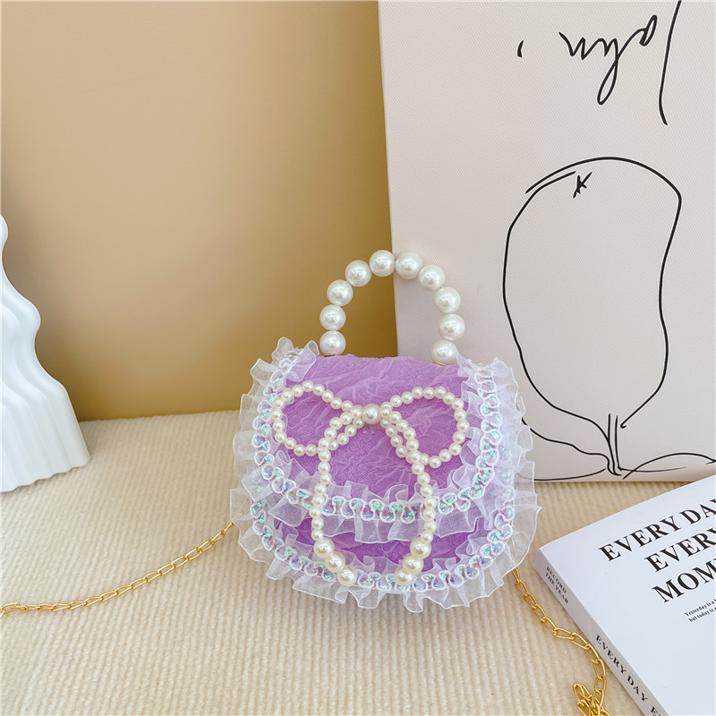 2022 nuevas niñas bolso de perlas de dibujos animados lindo arco princesa bolso de hombro estilo occidental encaje pequeño bolso de hombro