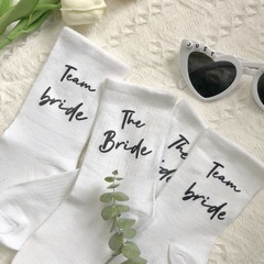 国境を越えたthe bride/team brideカジュアル靴下花嫁チーム靴下独身パーティーの写真