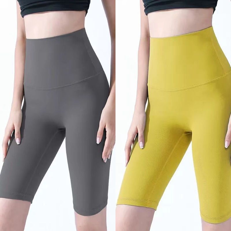 Pantalones cortos desnudos de mujer elásticos apretados para elevar las caderas de cinco puntos pantalones deportivos de secado rápido succión de sudor entrenamiento para correr fábrica de comercio de ping