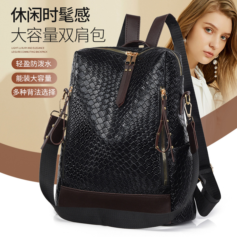 2024 nueva mochila de cuero suave tejida de moda europea y americana para mujer bolsa de mochila de viaje multiusos de gran capacidad en contraste