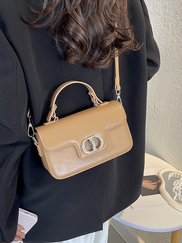 Bolso de mano de alta sensación para mujeres 2026 nuevo temperamento retro mochila de hombro pequeño bolso de lujo ligero