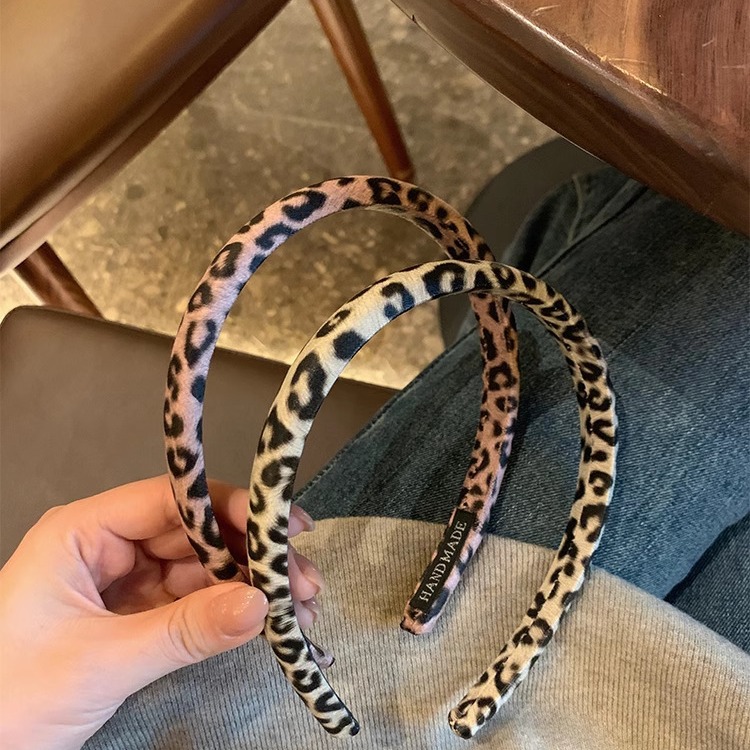 Nuevo estilo coreano de alta calidad estampado de leopardo hermoso banda de tela esponja textura de moda banda de cabeza de cráneo alto accesorios para el cabello