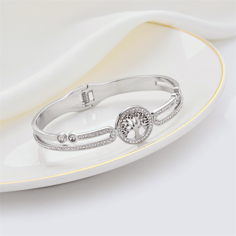 Ventas transfronterizas calientes nuevas pulseras de acero inoxidable chapadas al vacío nicho de diseño universal zircon árbol de vida pulseras de acero de titanio