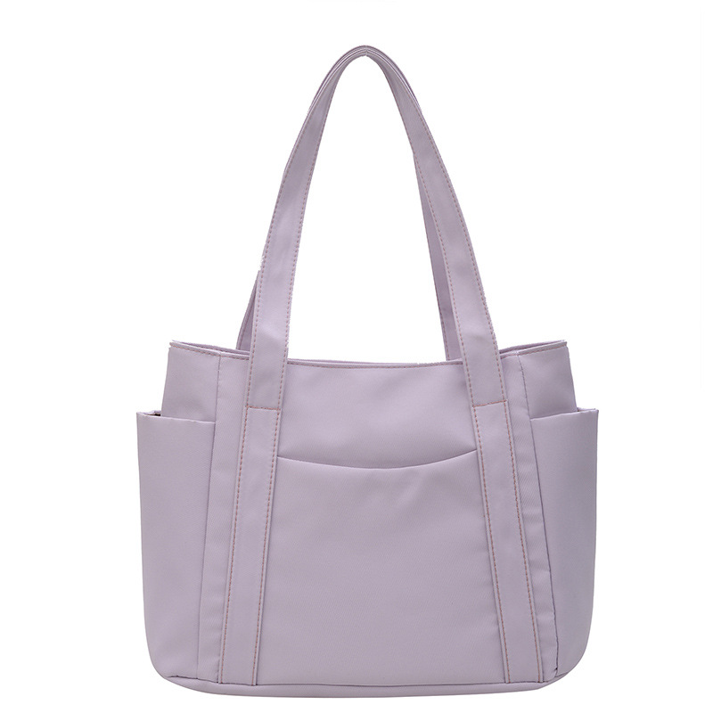 Bolso de gran capacidad para mujeres, nuevo estilo de moda, bolso de nylon, bolso de hombro casual, bolso de mano simple para mujeres.