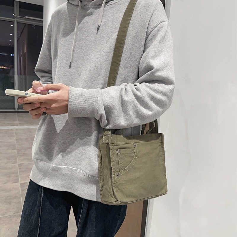 Bolso de lona lavado para mujer 2024 nuevo bolso de hombro minimalista literario de moda todo fósforo bolso diagonal portátil al por mayor