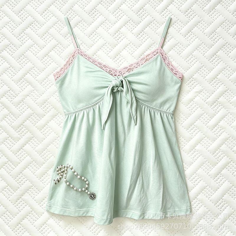 Purely desirable mint green contrast color lace camisole with thin straps, twisted tie, loose fit, and figure-flattering doll top Purely desirable mint green contrast color lace camisole with thin straps, twisted tie, loose fit, and figure-flattering doll top
