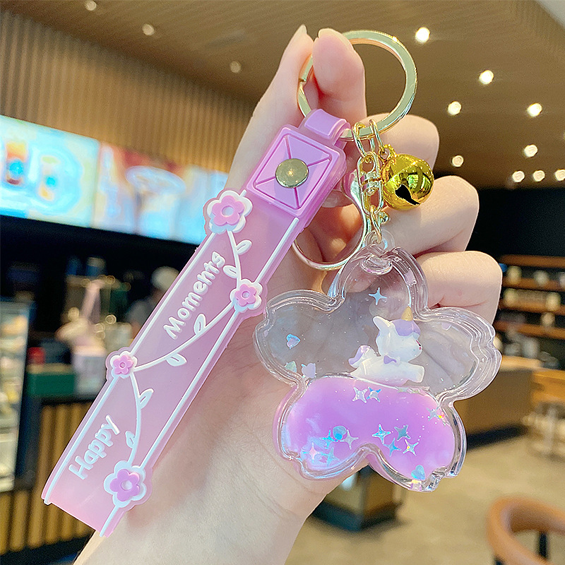 Púrpura estrella de cinco puntas líquido Quicksand llavero chica corazón flor de cerezo aceite colgante lindo tridimensional mochila adornos para mujeres