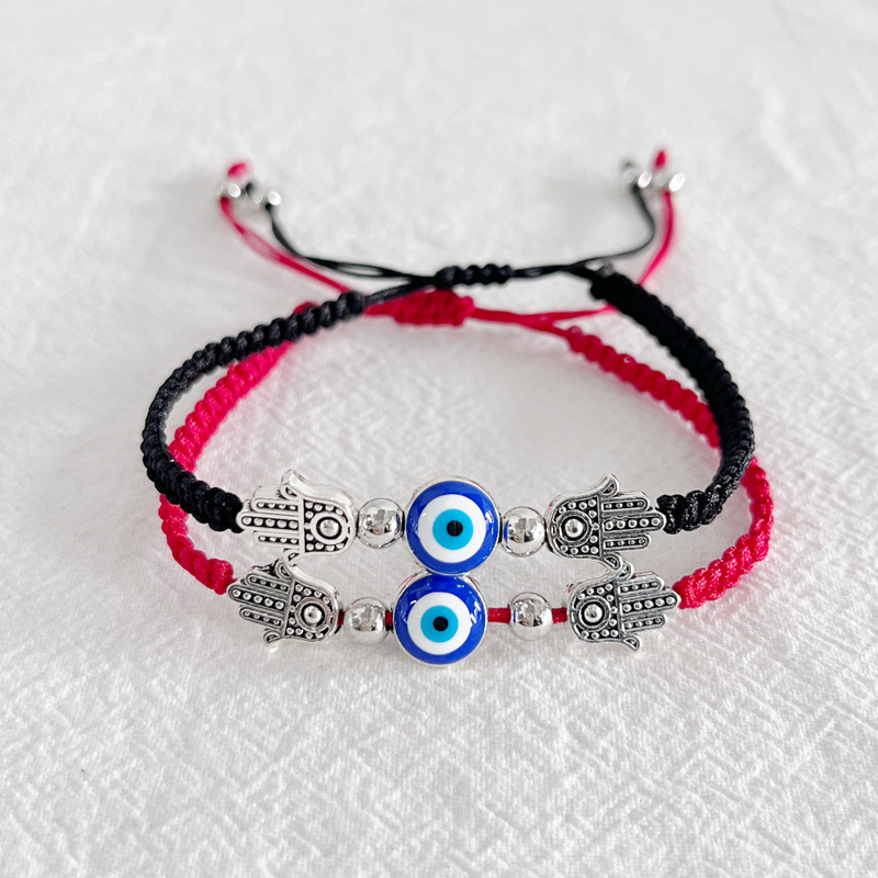 Cross-border hot new palm two round beads blue eyes evil eye red rope woven adjustable bracelet manufacturers wholesale
