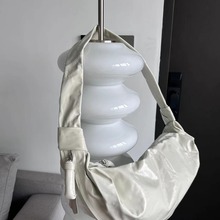 乐橙新款lemai小众真皮包斜跨包头层牛皮饺子包羊角包牛角包