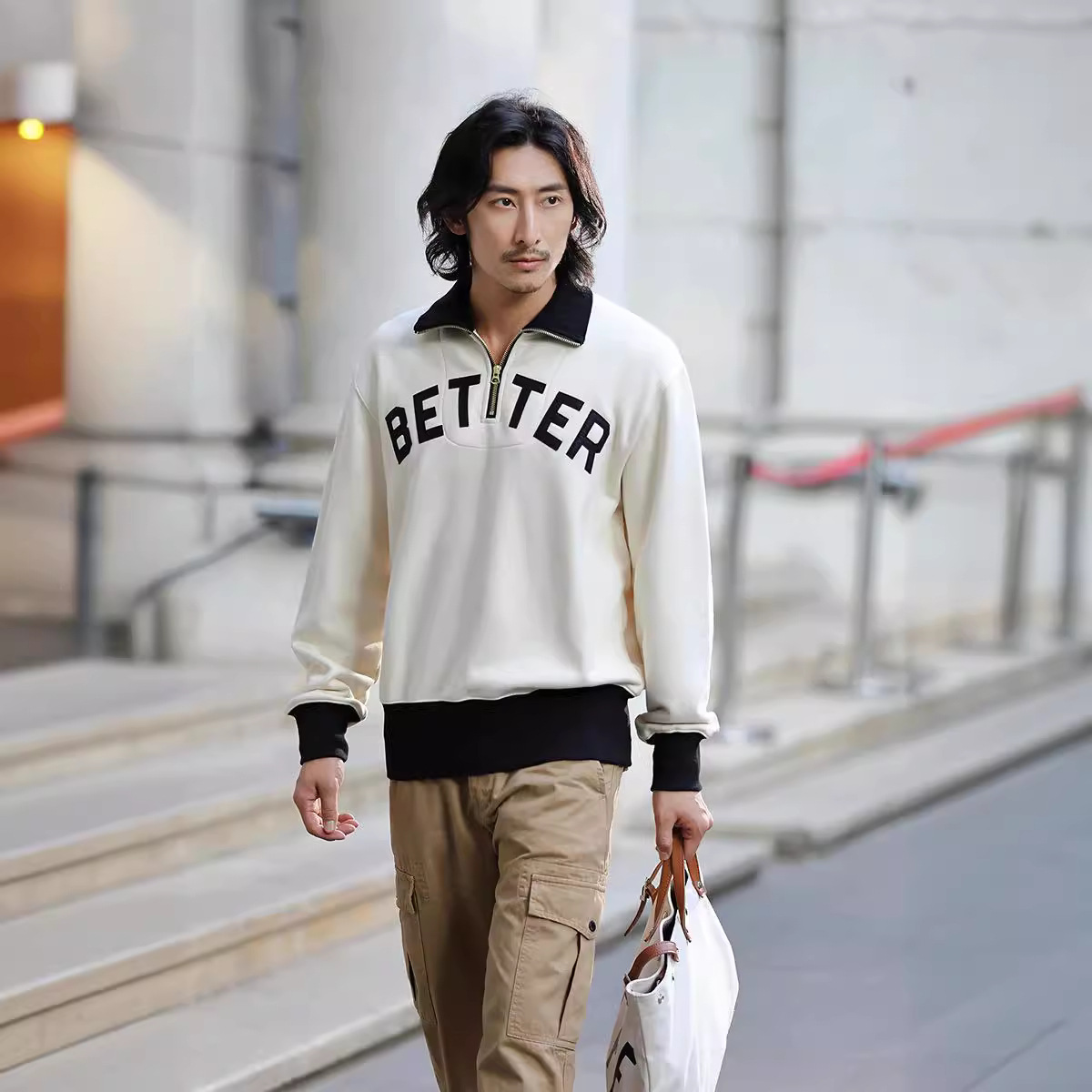 OKONKWO heavy color matching media cremallera solapa suéter engrosada bordado medio pecho cremallera cuello alto suéter