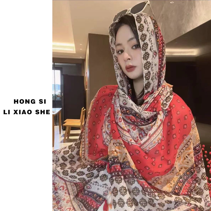 Chal de protección solar de verano para mujer 2025 nuevo estilo hebilla largo estilo étnico fotografía de viaje estilo fino playa bufanda de seda capa