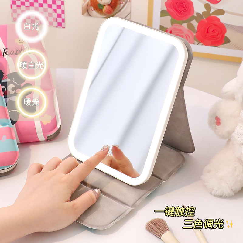 Espejo de maquillaje portátil de escritorio de escritorio para dormitorios de estudiantes domésticos con lámpara de vestir espejo plegable pequeño