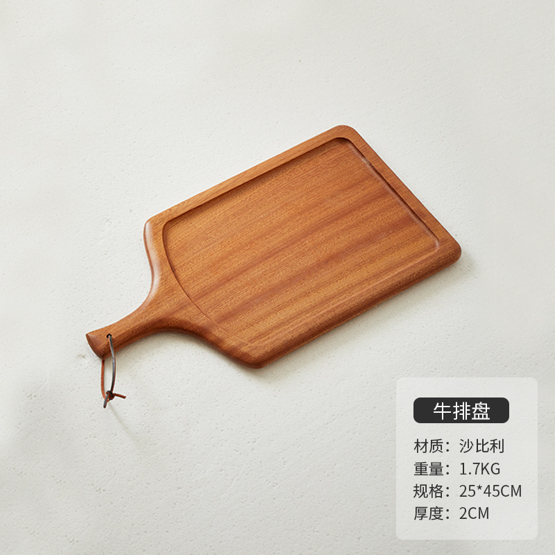 木のステーキの食事皿日本式の木のピザの皿の牛の板の食器の木の皿の木のトレーの洋食は皿を並べます。|undefined