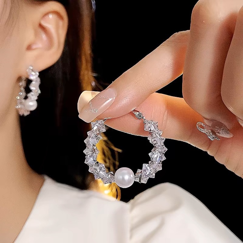 Sophisticated small design fashionable earrings with zircon from…