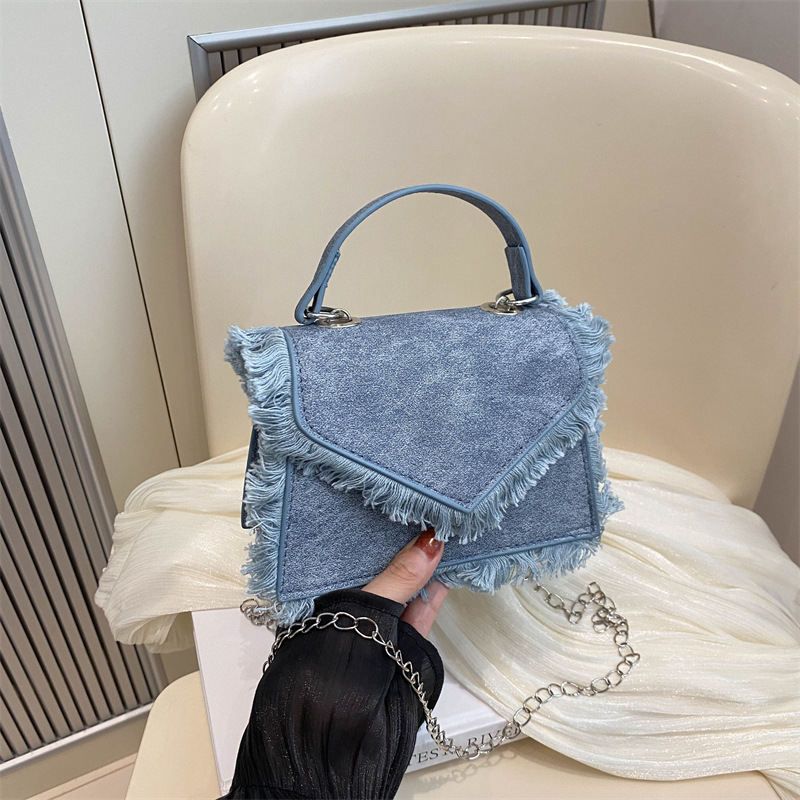Bolso de borla de mezclilla para mujer 2024 nuevo bolso de hombro de cadena de alta gama retro de nicho bolso de mensajero portátil de moda
