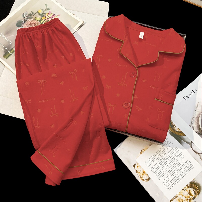Women's new autumn and winter pajama set: a vibrant red, open-front cardigan with a notched collar, made of thickened fleece fabric, featuring an embossed bow design, and a casual, simple style