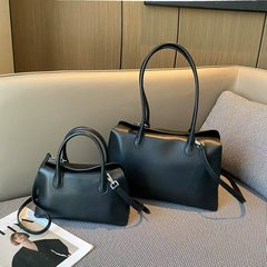 ファッションの経典の本革の女性カバンの新型のクロスボーダーのハンドバッグの大容量の肩の脇の下のカバンの女性の爆発的なボーリングのカバン