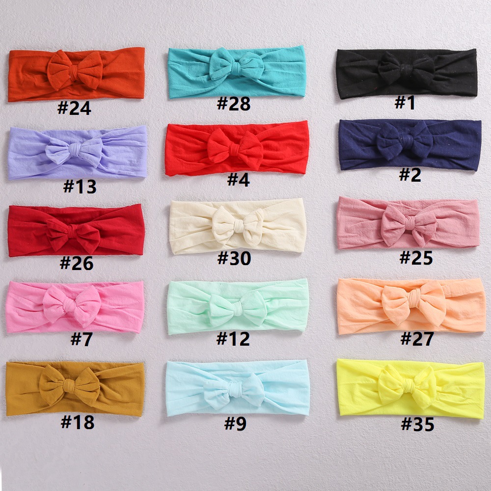 European and American cross-border new children's hair accessories baby bow headband baby care door nylon hair band wholesale_voghion.com