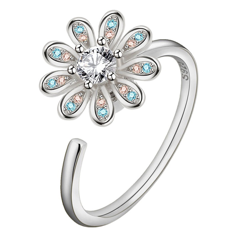 Europa y América transfronteriza Venta caliente anillo giratorio hembra apertura giratoria ajustable circón flor anillo temperamento anillo