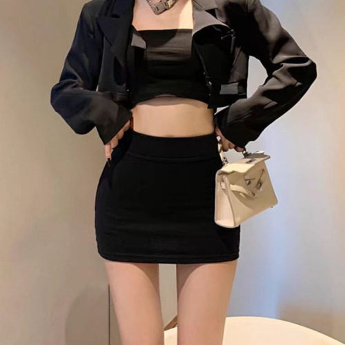 Hip-hugging, cropped skirt: chic, figure-flattering mini dress with high waist—perfect for petite figures, offering a tall, slimming effect in plus sizes and stretchy fabric.