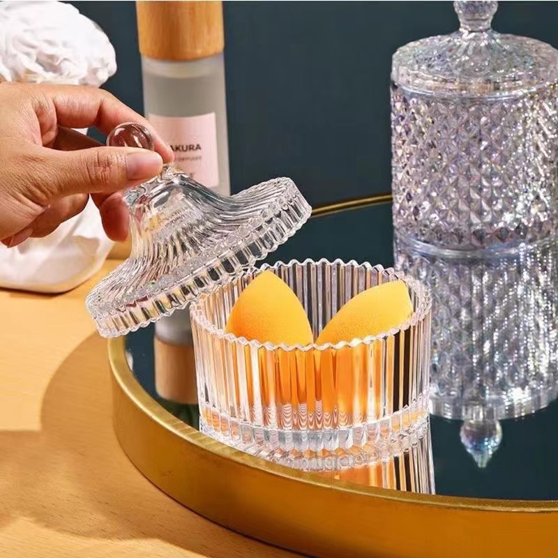 Creativa europea de alto valor visual, latas de vidrio transparente, latas de dulces con tapa, latas de azúcar cúbico, latas de almacenamiento de algodón domésticas, tazón desmagnetizante