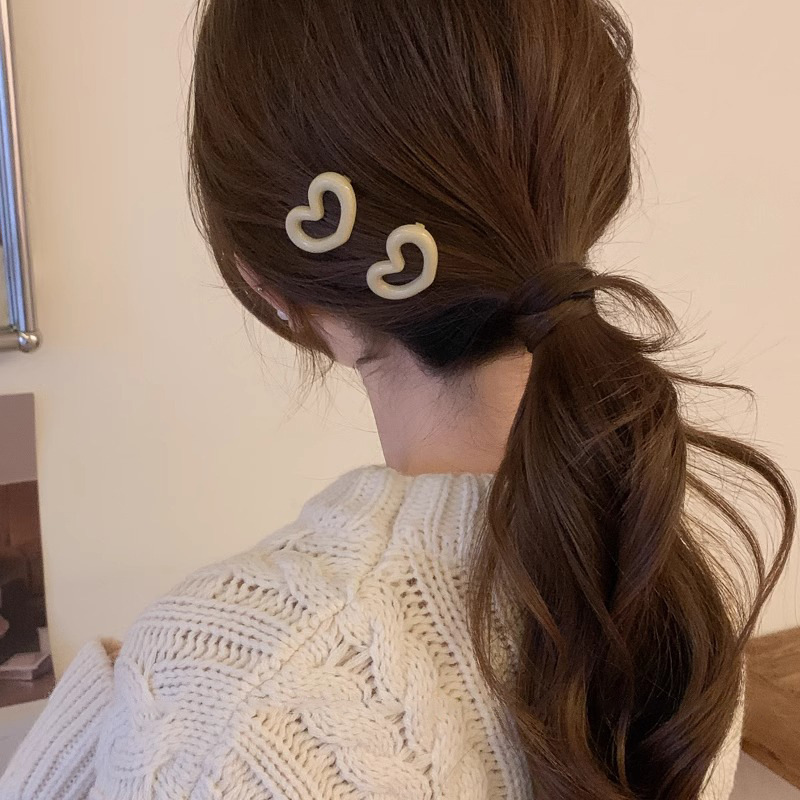 Bonito dulce rosa amor abrazadera de cabello de plástico simple y libre borde lateral frisa abrazadera de cabello en forma de corazón