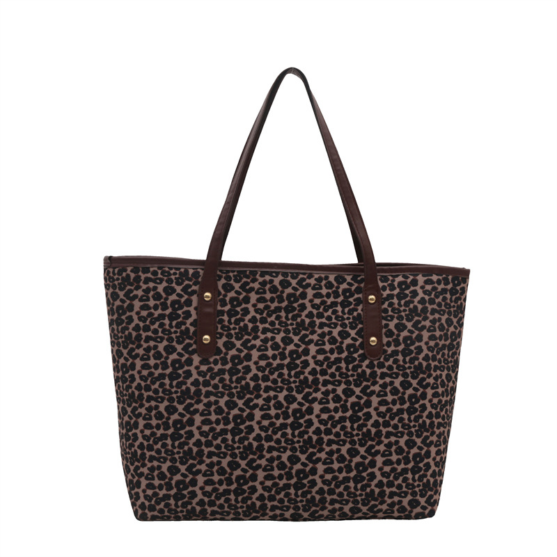 Gran capacidad de aire extranjero 2024 moda nueva personalidad leopardo casual in otoño tote bolso de hombro de mano para mujeres