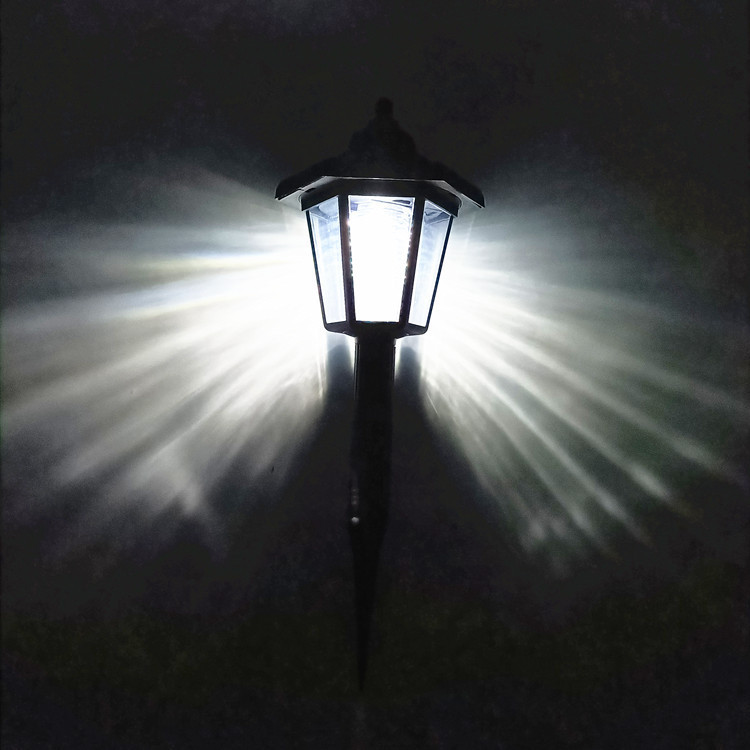 Fábrica suministra luz solar LED de pared de inducción césped patio villa decoración hexagonal paisaje jardín luz exterior