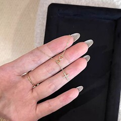 莫比乌斯十字架吊坠项链女新款轻奢小众高级感颈链简约个性锁骨链