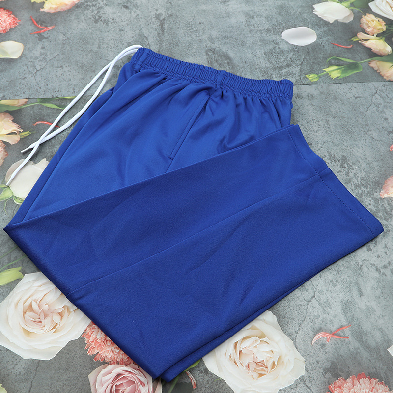 Pantalones de uniformes escolares azules sólidos de luz para estudiantes de primaria y secundaria unisex pantalones deportivos de verano rectos sueltos