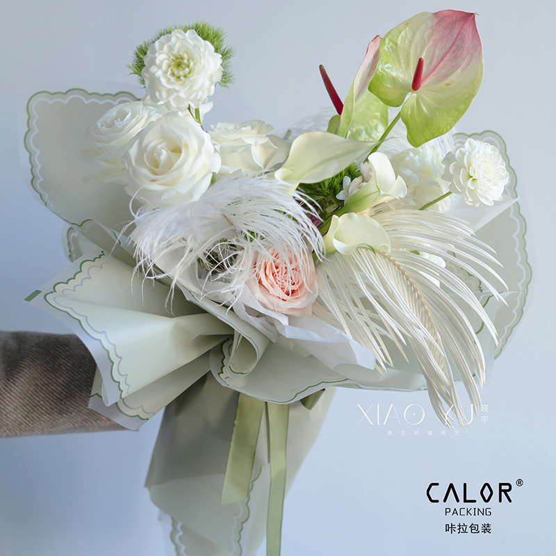 Fábrica de fiestas de flores al por mayor nueva línea de textura flor embalaje florista de color sólido papel de envoltura flor