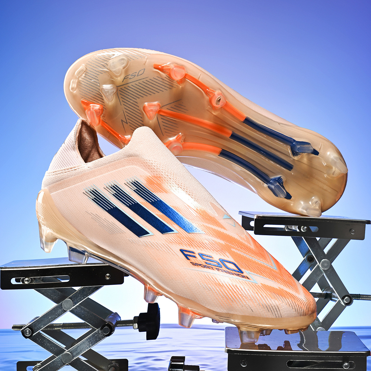 Zapatos de fútbol infantiles transfronterizos, zapatos de fútbol adolescentes masculinos, estudiantes, zapatos de fútbol femeninos TF, zapatos de fútbol aggravar al por mayor