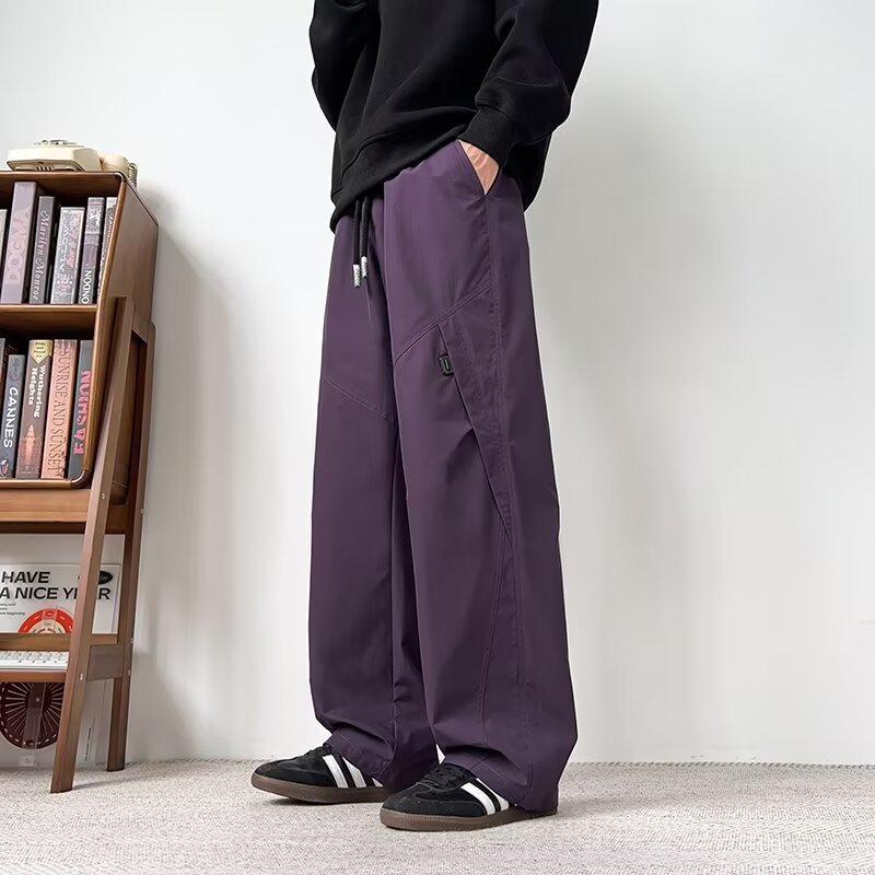 Hombres sueltos de tamaño grande comercio exterior primavera y otoño nuevos pantalones casuales de tamaño grande pantalones juveniles recto pantalones de piernas anchas transfronterizos