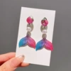 A pair of 17# blue and pink fish tails
