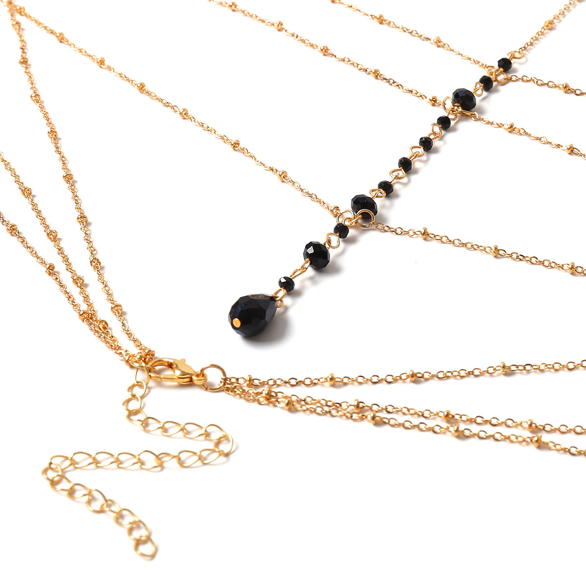 Personalidad europea y americana Cadena de pecho de cristal negro Cadena de cuerpo de borla simple mujer sexy multi-capa cristal un collar Accesorios