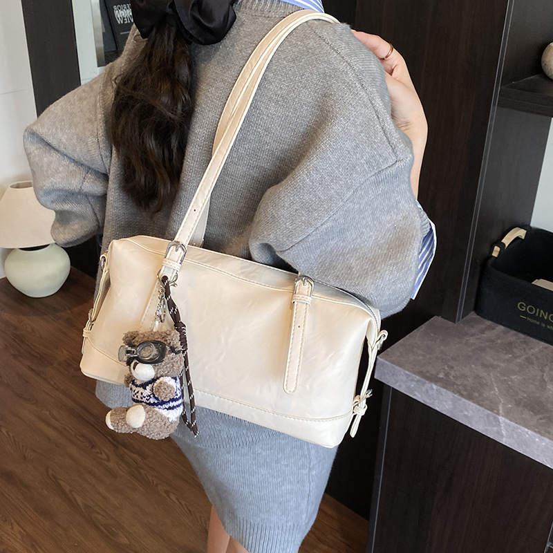Coreano simple retro bolso portátil de Boston mujeres otoño / invierno 2025 nuevo estilo de alta sensación bolso de hombro bolso de brazo