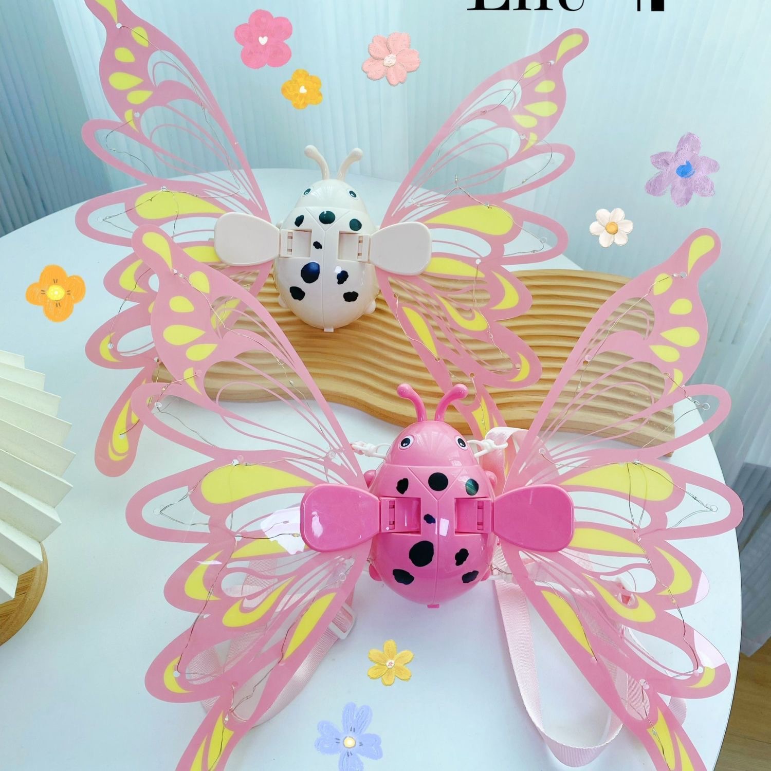 Juguetes de niñas transfronterizos pequeños ángeles alas luminosas mariposa alas niños luz música flores hadas alas al por mayor