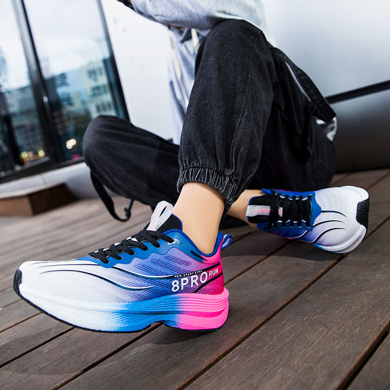 National Trendy Youth Superlight Flying Malla tejida transpirable Zapatos para correr Hombres y mujeres con amortiguación Palomitas de maíz Zapatos deportivos de suela blanda