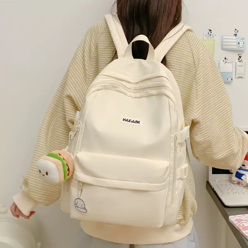 韩版时尚简约休闲男背包大容量潮流初高中大学生女双肩包厂家批发